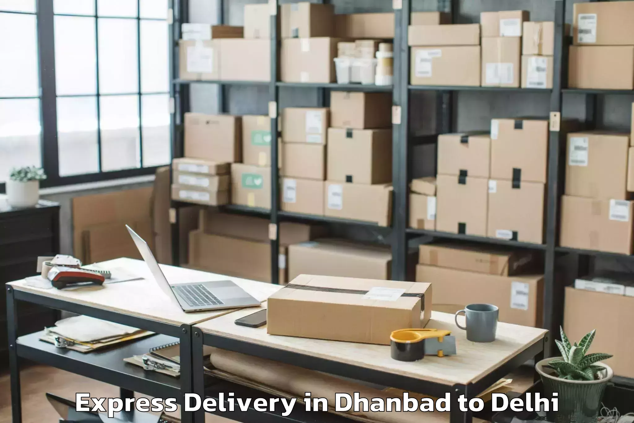 Expert Dhanbad to Defence Colony Express Delivery